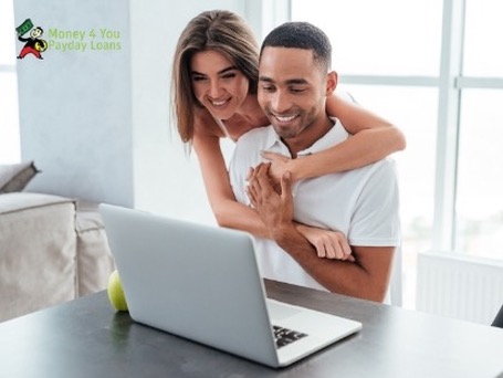 Happy Couple with Laptop